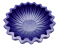 A scalloped-edge resin bowl in a deep periwinkle, shown from a top-down perspective on a solid white background.