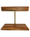 Wooden jewelry stand with a brass rod on a white background