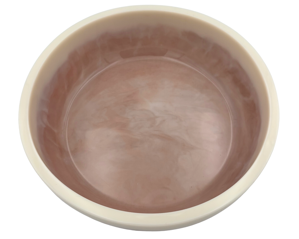 A round resin bowl with a glossy, swirled tan nterior and a smooth, off-white exterior rim, shown from a top-down perspective on a white background.
