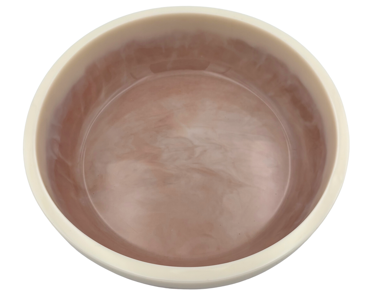A round resin bowl with a glossy, swirled tan nterior and a smooth, off-white exterior rim, shown from a top-down perspective on a white background.