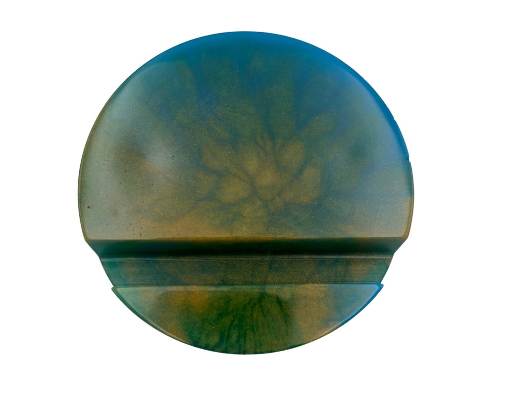 circular resin phone holder with blue, green, and gold swirls on white background

