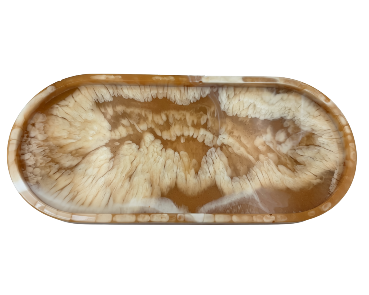 An oval resin tray with a swirling agate-like pattern in shades of brown, tan, and cream, isolated on a white background.