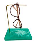 Green resin base glasses holder with pair of glasses on brass rod