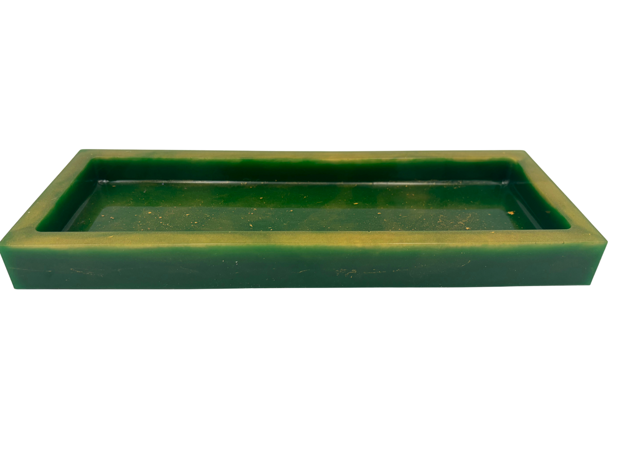 A rectangular resin tray with a thick gold-toned border and a dark green base with gold flecks shown on a plain white background.