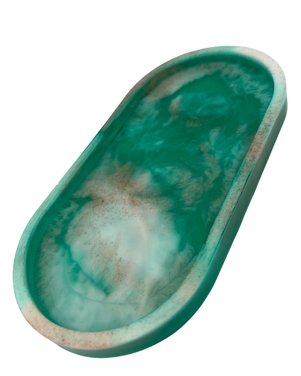 An oval resin tray with a marbled pattern of teal green, white, and light brown, isolated on a white background.