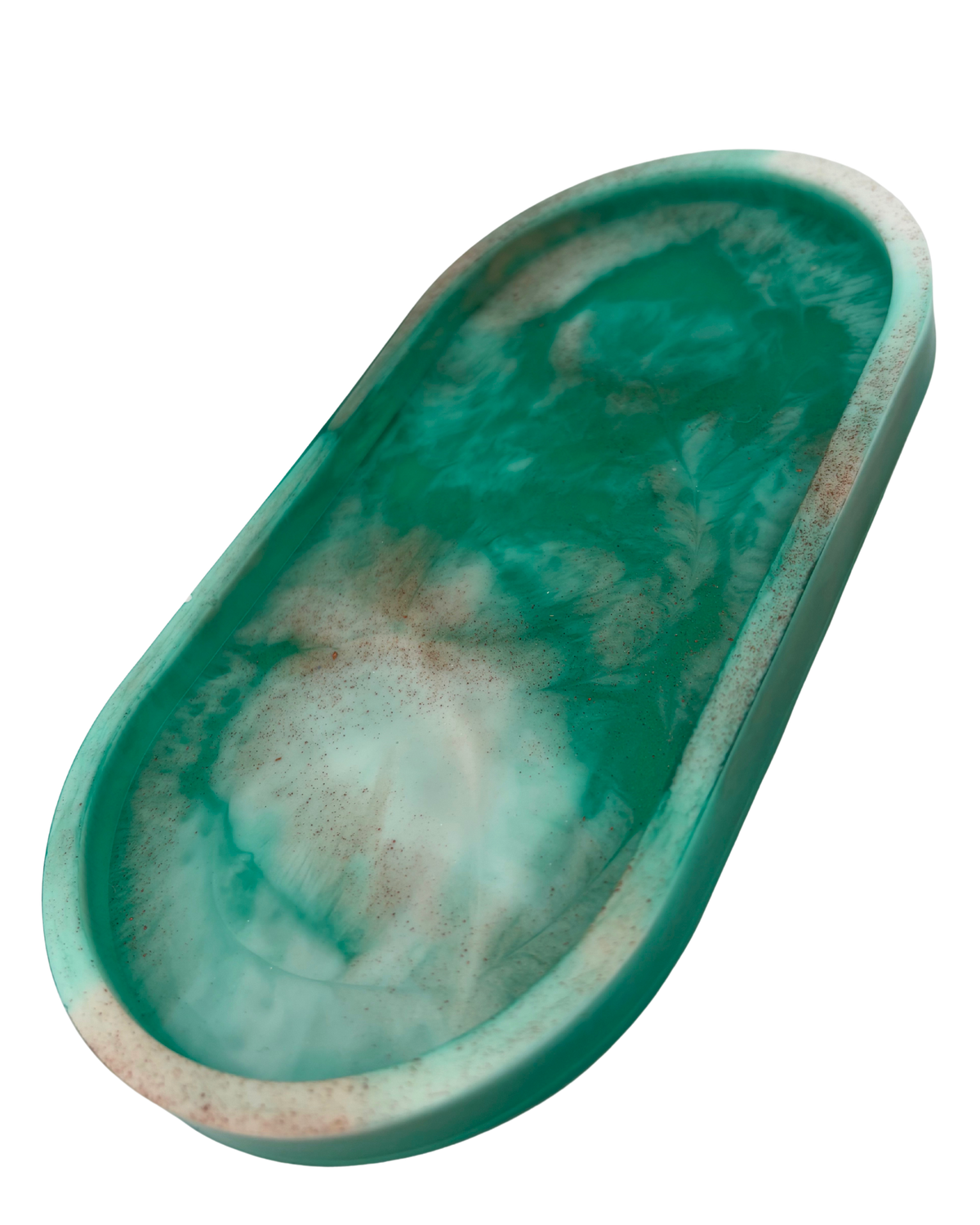 An oval resin tray with a marbled pattern of teal green, white, and light brown, isolated on a white background.
