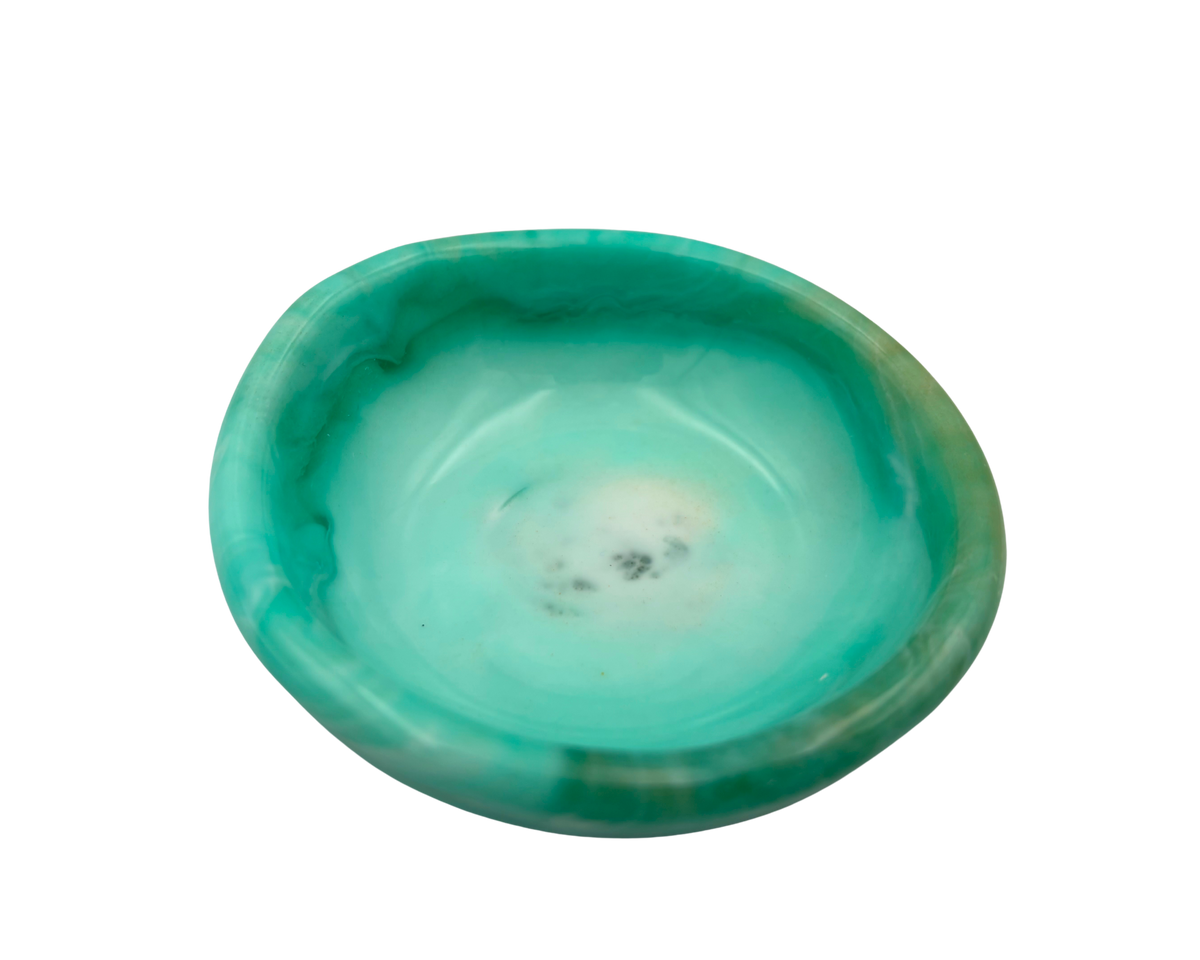 A polished turquoise resin dish with a smooth, rounded interior and natural marbled patterns of teal, green, and white, shown on a solid white background.