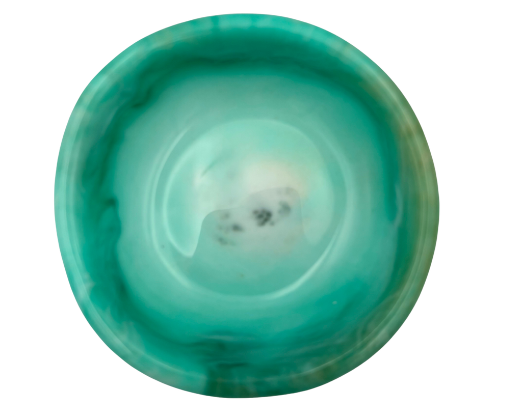 A polished turquoise resin dish with a smooth, rounded interior and natural marbled patterns of teal, green, and white, shown on a solid white background.