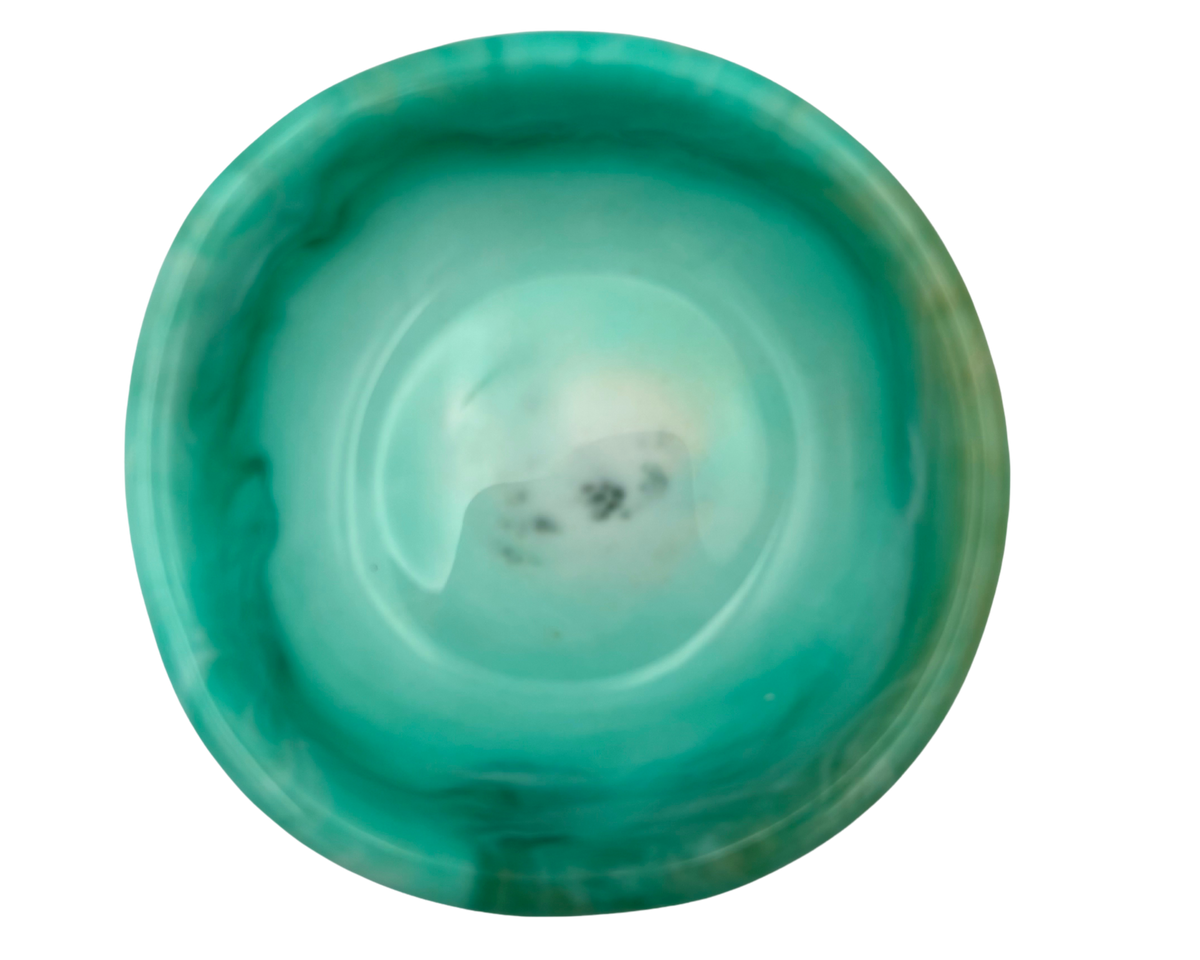 A polished turquoise resin dish with a smooth, rounded interior and natural marbled patterns of teal, green, and white, shown on a solid white background.