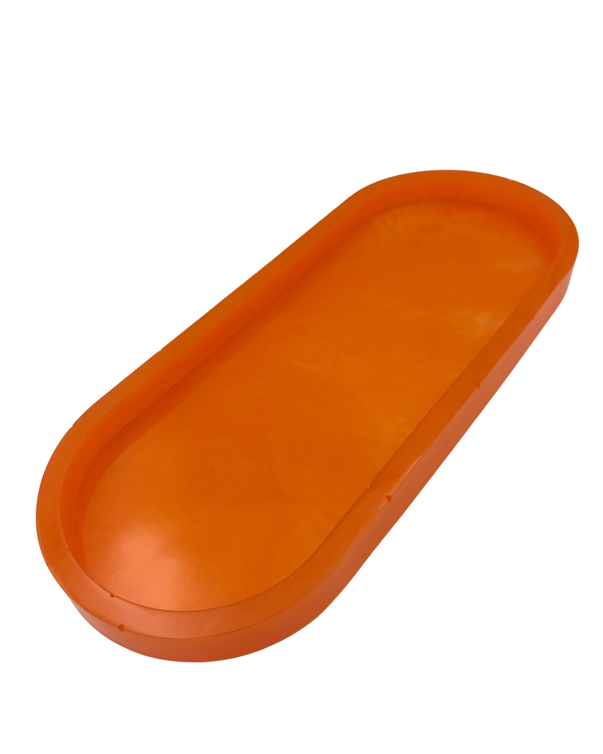 An orange translucent resin tray with a rounded rectangular shape and raised rim, shown against a plain white background.