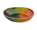 A shallow oval bowl with a colorful tie-dye pattern in shades of purple, green, yellow, orange, and red, finished with a gold rim, shown on a plain white background.