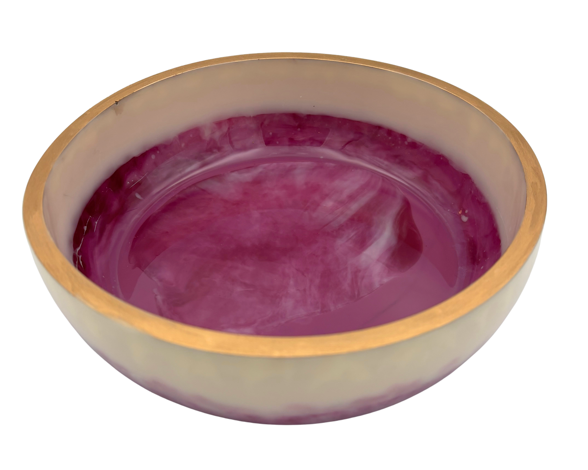 A round bowl with a glossy deep magenta-purple interior and a light beige exterior, shown on a plain white background.