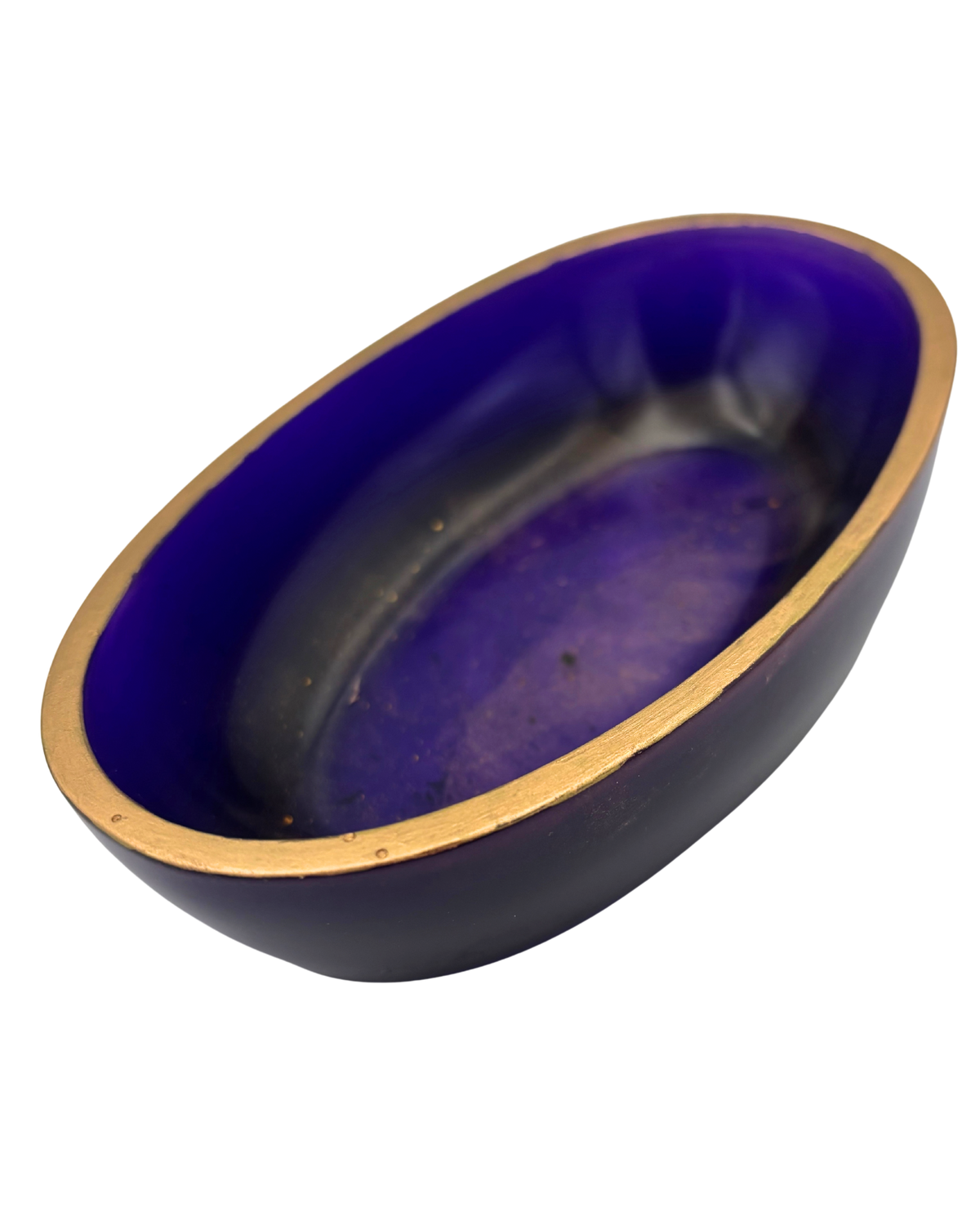 An oval resin dish with a deep purple and gold flecked interior and a metallic gold rim, shown against a plain white background.
