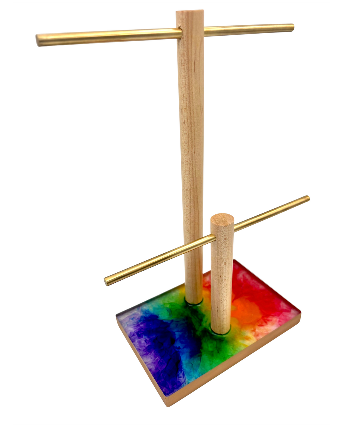 Jewelry stand with colorful base and two tiers on a white background