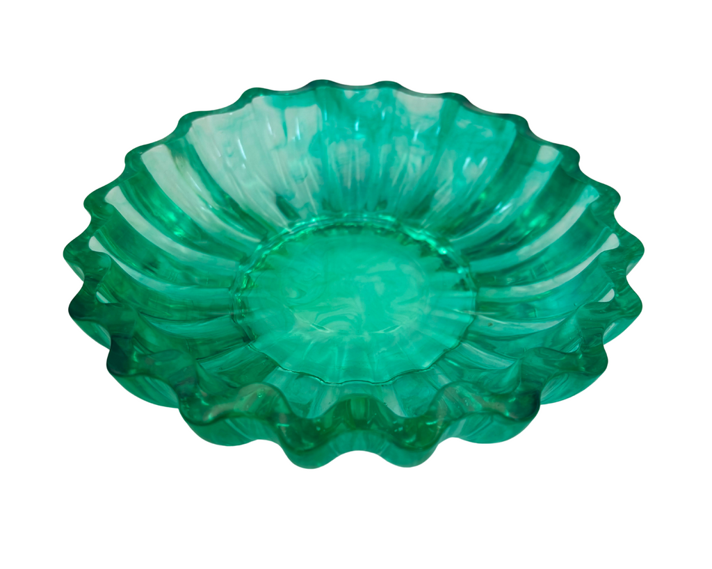 Green resin bowl with scalloped edges