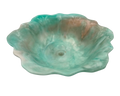 A handmade resin bowl with petal-shaped rim, featuring a marbled swirl of mint green, teal, white, and subtle peach-brown tones, isolated on a white background.