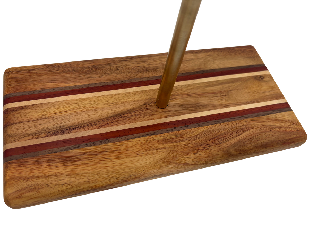 Close up of wooden base of jewelry holder